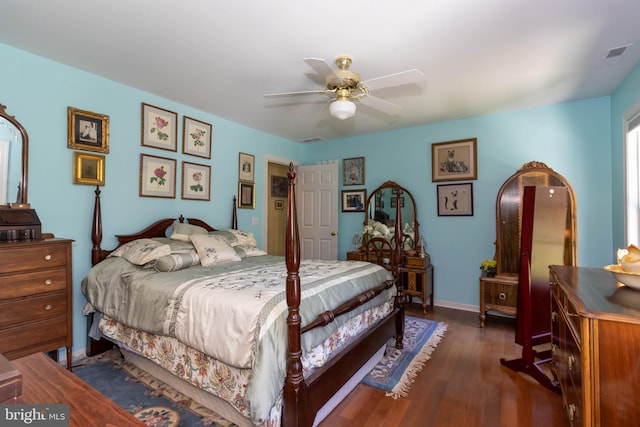 bedroom featuring ceiling fan and dark wood-type flooring