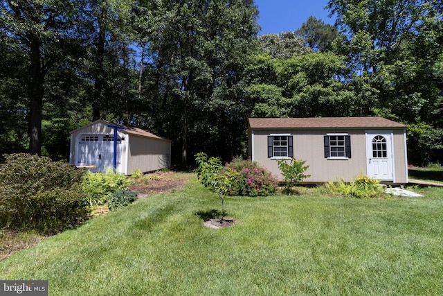 exterior space featuring a front lawn and a shed