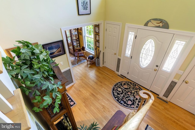 foyer with light hardwood / wood-style flooring