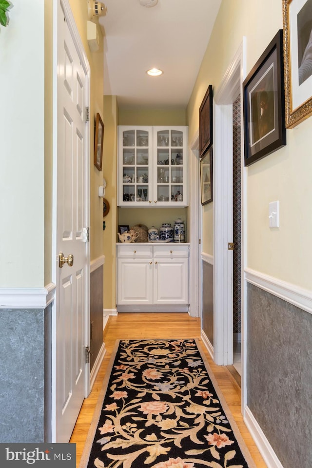 hall featuring light hardwood / wood-style floors