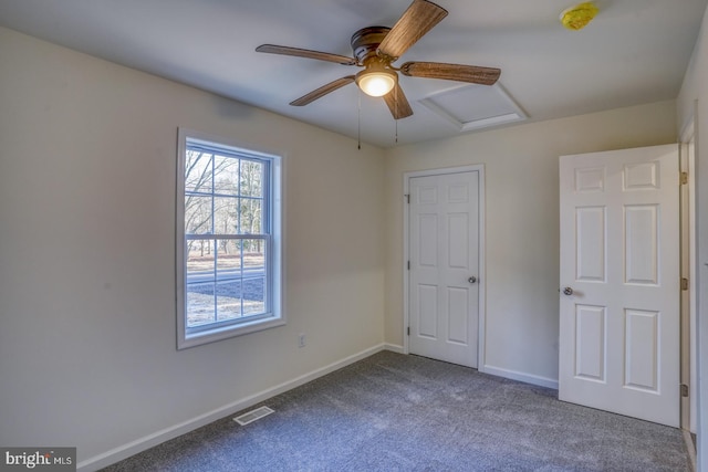 unfurnished bedroom with ceiling fan and carpet flooring