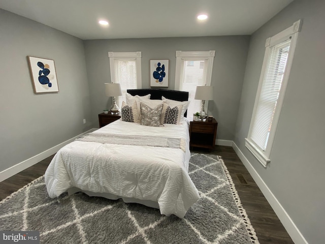 bedroom featuring dark hardwood / wood-style floors