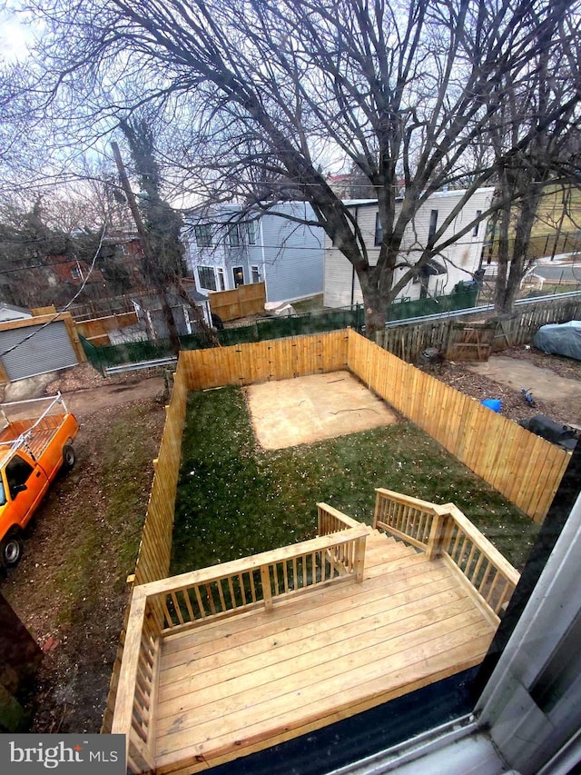 view of yard with a wooden deck