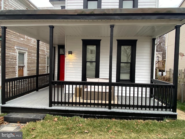 deck with covered porch