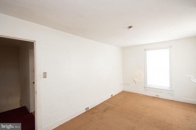 view of carpeted spare room