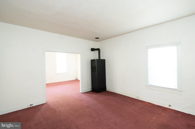 unfurnished room with carpet floors