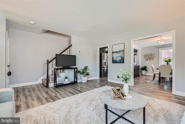 living room with hardwood / wood-style flooring