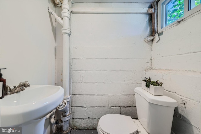 bathroom with sink and toilet