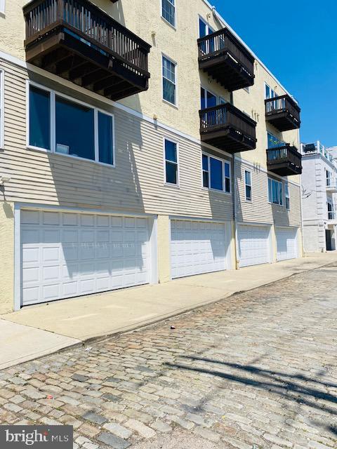 view of building exterior with a garage