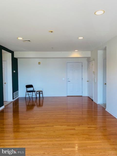 unfurnished room with light hardwood / wood-style flooring