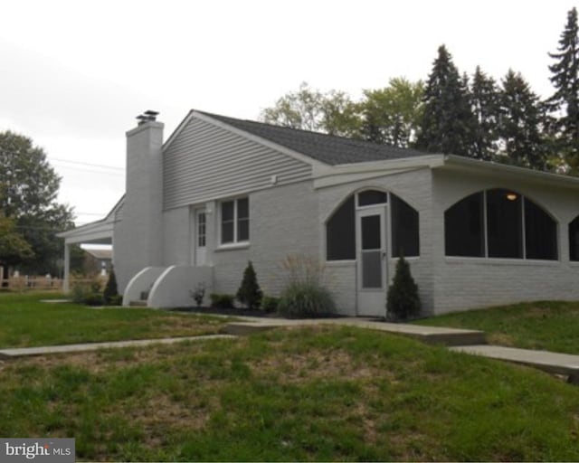 exterior space with a front yard