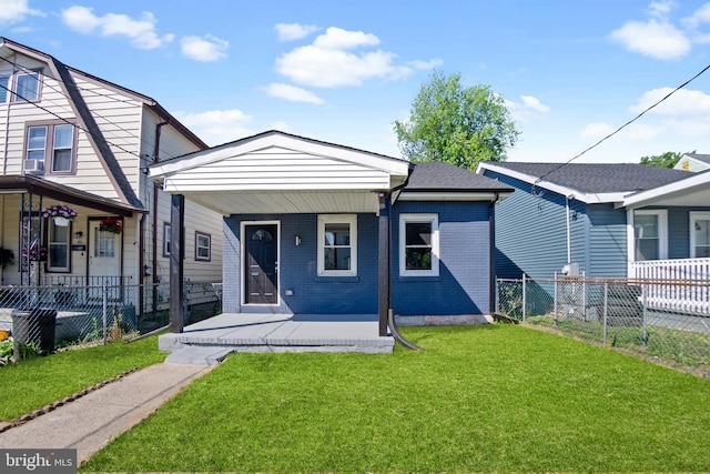 view of front of home featuring a porch and a front lawn