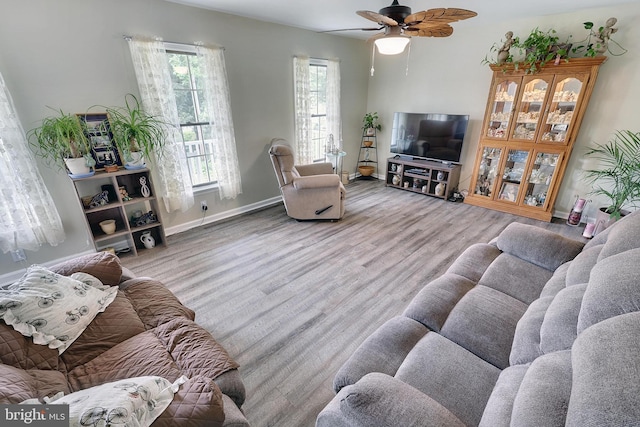 living room featuring ceiling fan