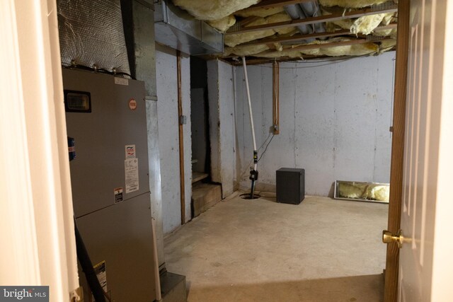 basement featuring heating utilities