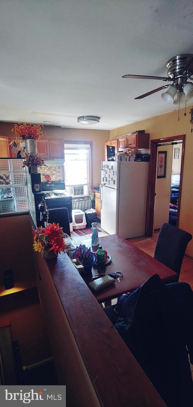 living room featuring ceiling fan