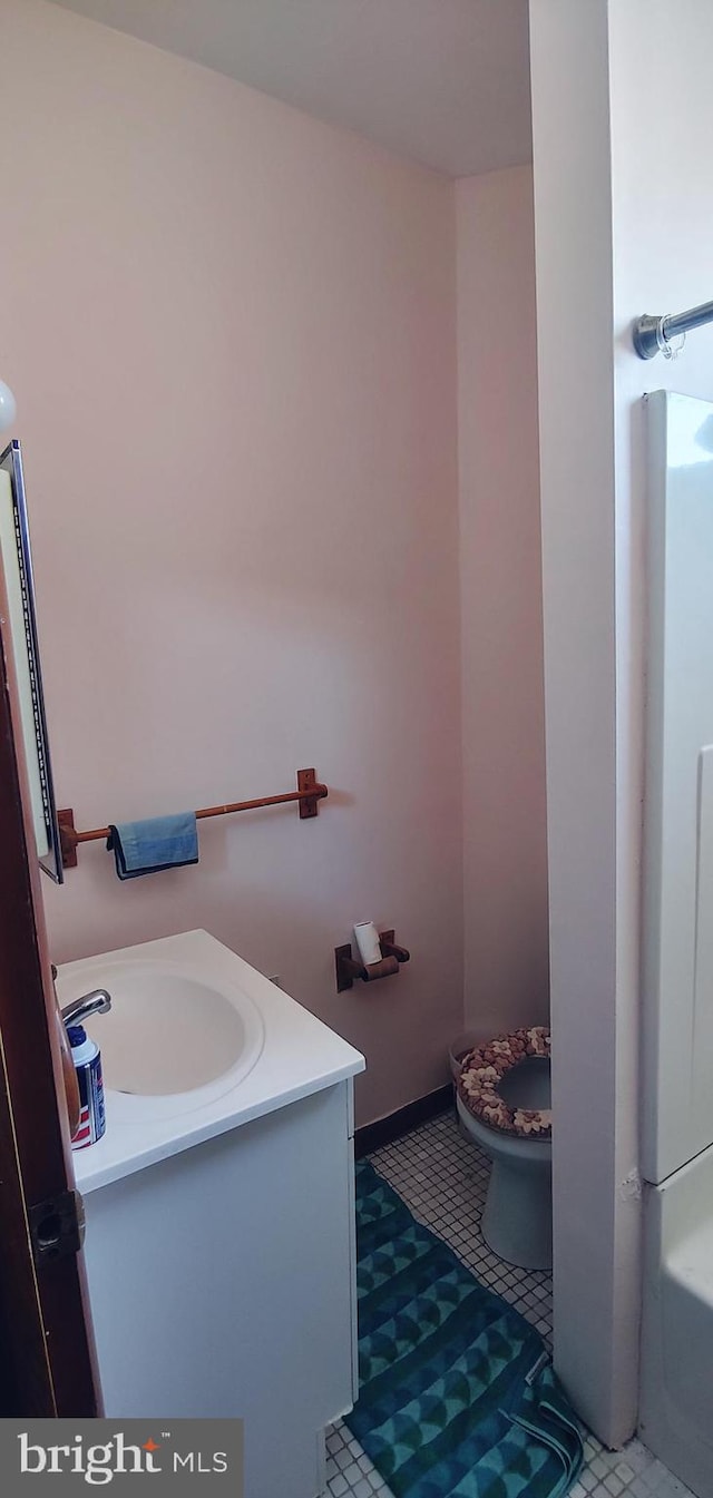 full bathroom featuring tile flooring, vanity, toilet, and shower / bathing tub combination