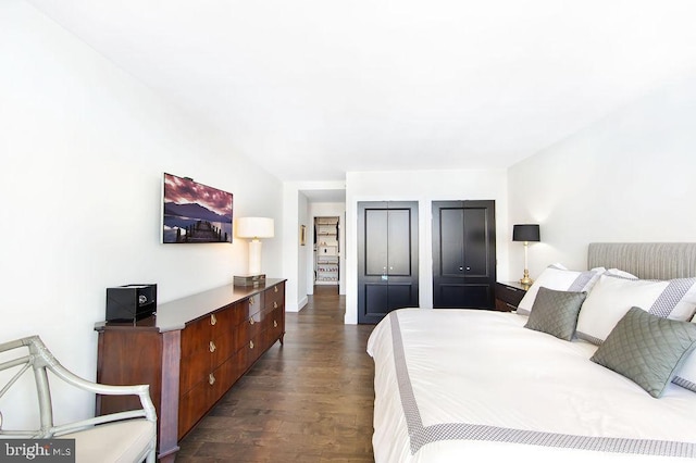 bedroom featuring dark hardwood / wood-style floors