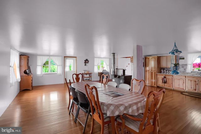 dining space featuring light hardwood / wood-style floors