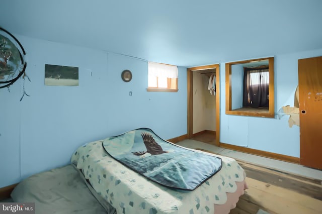 bedroom featuring hardwood / wood-style floors