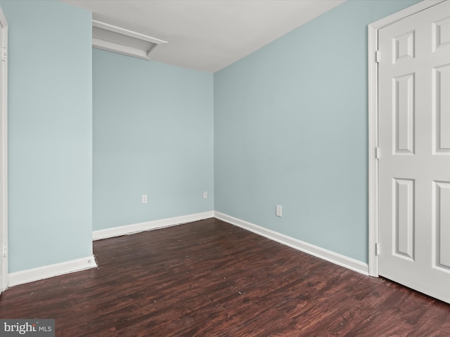 empty room featuring hardwood / wood-style flooring