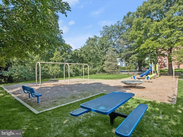 view of jungle gym with a lawn