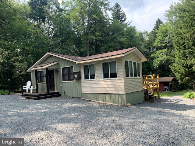 view of front of property with a deck