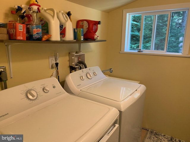 laundry area with independent washer and dryer