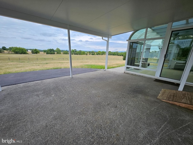 view of patio with a rural view