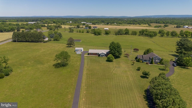 drone / aerial view with a rural view and a mountain view