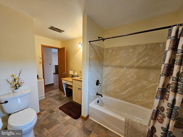 full bathroom featuring toilet, shower / tub combo, and vanity