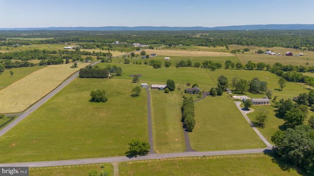 birds eye view of property featuring a rural view