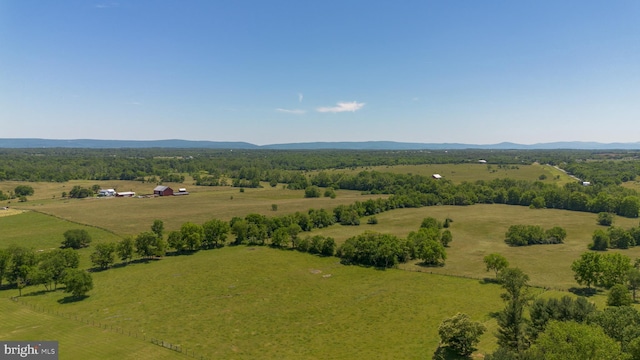 drone / aerial view with a rural view and a mountain view