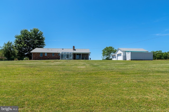 view of yard featuring a garage