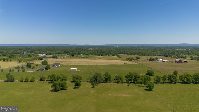 birds eye view of property featuring a rural view and a mountain view