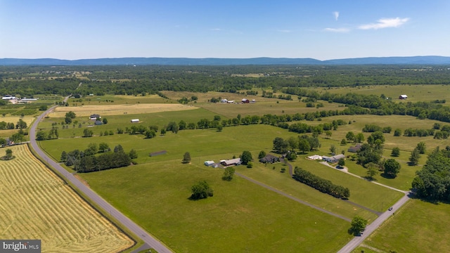 aerial view featuring a rural view and a mountain view