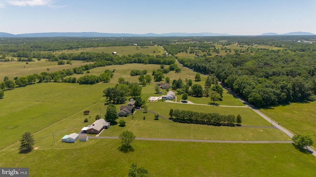 bird's eye view with a rural view and a mountain view