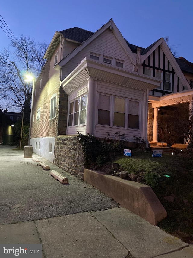 view of property exterior at dusk