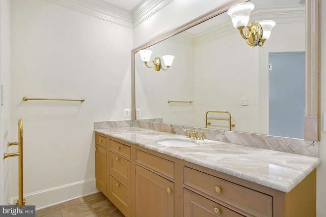 bathroom featuring crown molding, vanity, and a notable chandelier