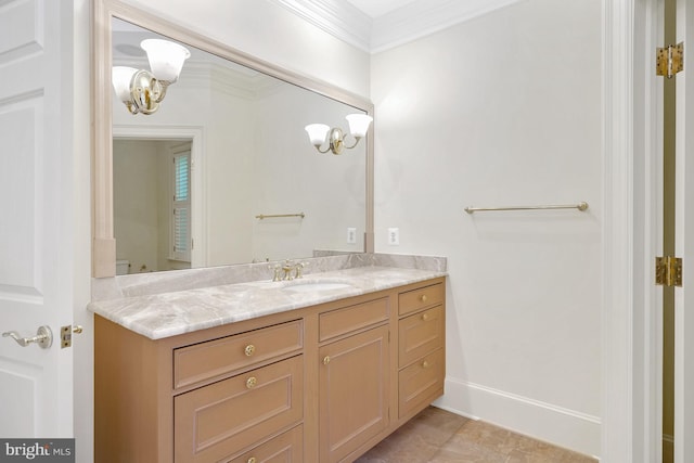 bathroom featuring tile patterned flooring, vanity, and ornamental molding