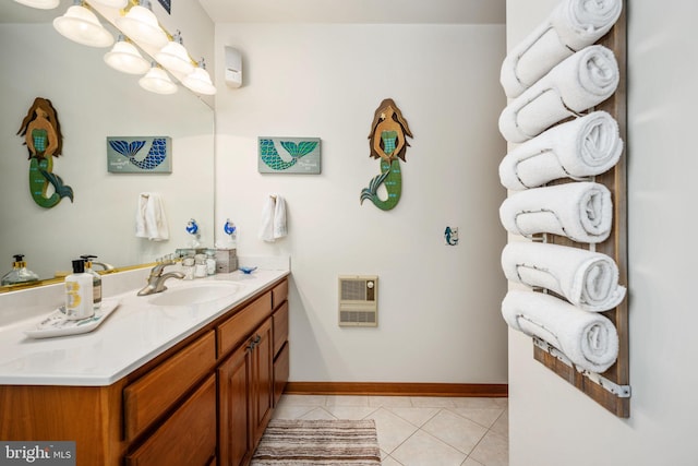 bathroom with vanity with extensive cabinet space and tile flooring