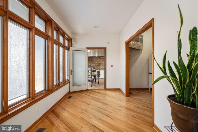 interior space featuring a wealth of natural light and light wood-type flooring