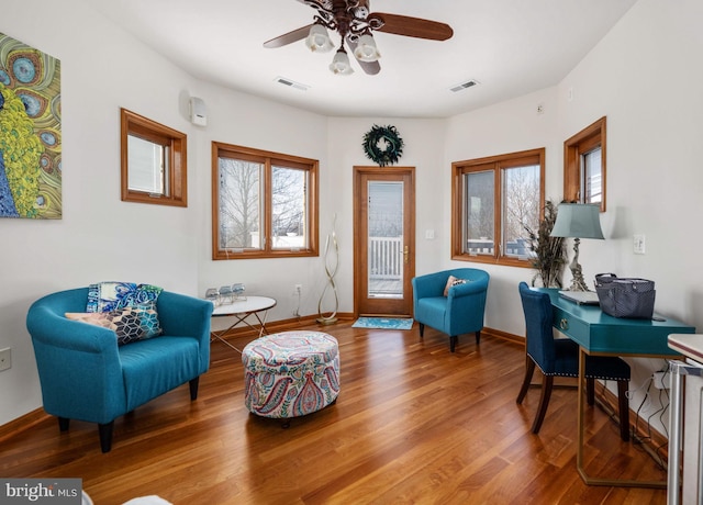 interior space featuring ceiling fan and hardwood / wood-style floors