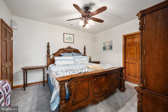 bedroom with tile flooring and ceiling fan