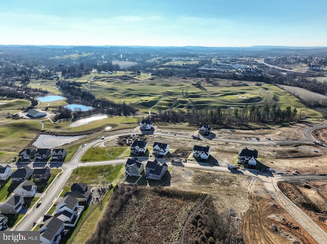 birds eye view of property with a water view and a residential view