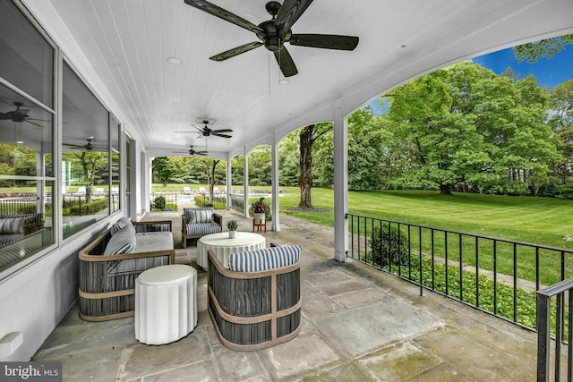 view of patio / terrace featuring ceiling fan