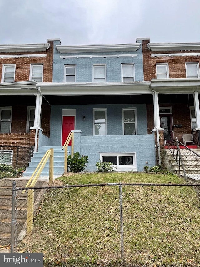 view of property with covered porch