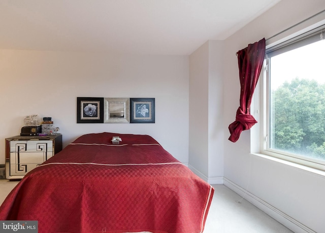 bedroom featuring carpet