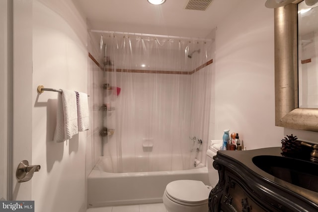 full bathroom with tile floors, toilet, vanity, and bathing tub / shower combination