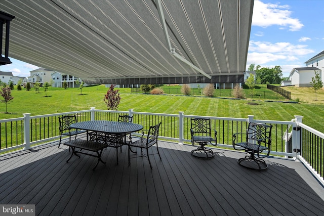 deck featuring a lawn