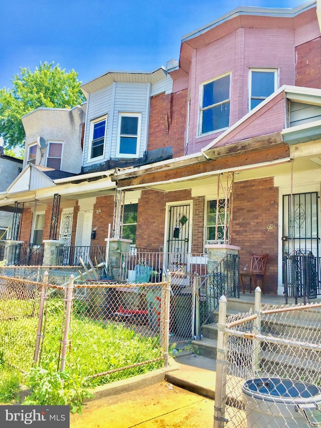 multi unit property featuring covered porch